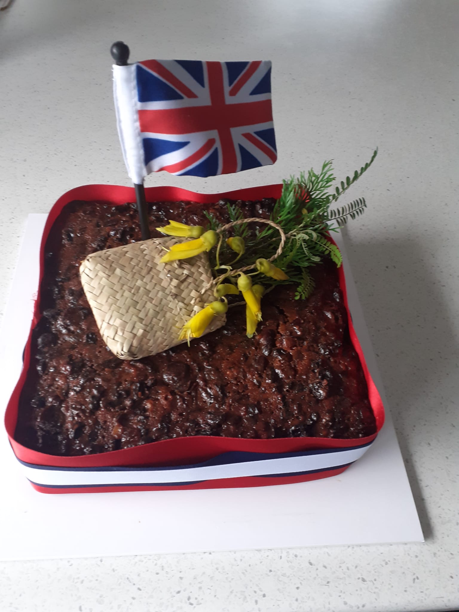 The Famous Judy Collins Fruit Cake beautifully decorated by Sue Helleur